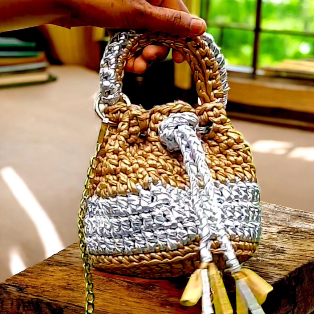 Shiroli_handmade_gold_and_silver_crochet_potli_bag Image 3