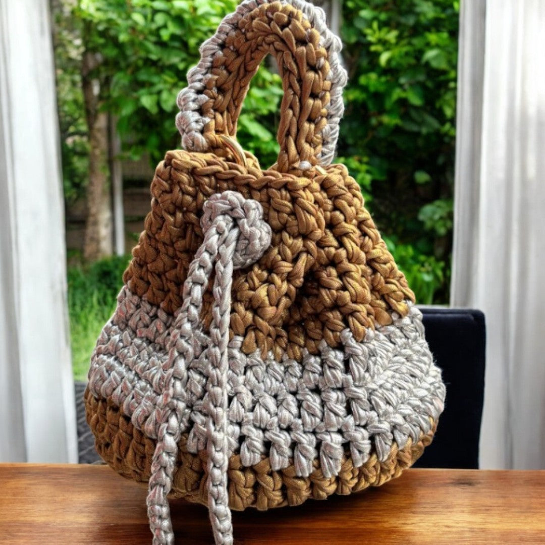 Shiroli_handmade_gold_and_silver_crochet_potli_bag Image 2
